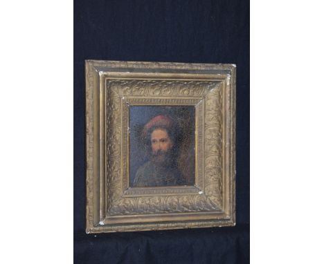 An oil painting, Eastern European School - "A bust portrait of a bearded man wearing a fur-trimmed hat", unsigned, inscribed 