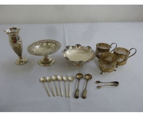 A quantity of silver to include two dishes, a vase, three tea glass holders and flatware