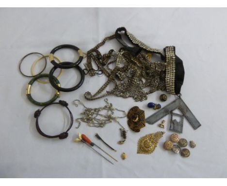 A quantity of costume jewellery to include hat pins, bangles and an item of Masonic interest