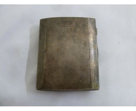 A silver engine turned cigarette case