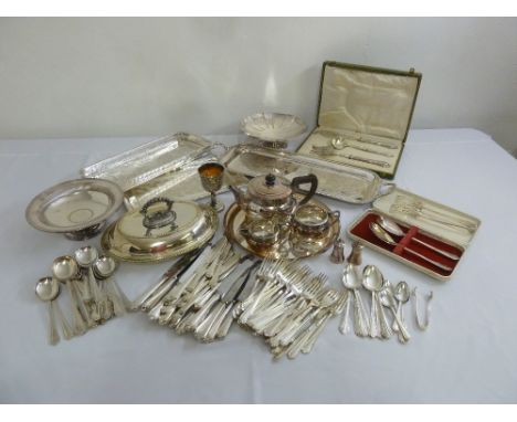 A quantity of silver plate to include flatware, trays, dishes and a teaset