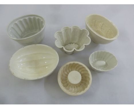 A quantity of antique ceramic jelly moulds of various forms and sizes (6)