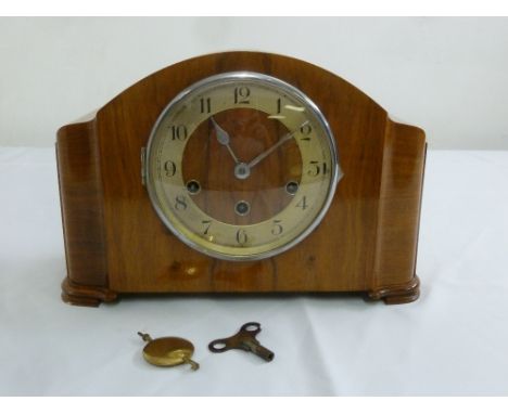 A mid 20th century mahogany cased two train movement mantle clock, to include key and pendulum