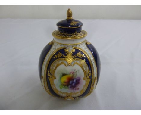 A Royal Worcester mid 19th century pear shaped vase with raised pull off cover, the sides decorated with panels of fruit, sig