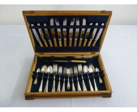 A cased set of silver plated flatware for six persons in fitted table top mahogany case