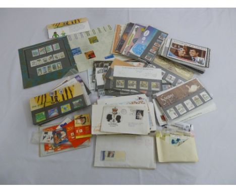 A quantity of first day covers and loose stamps