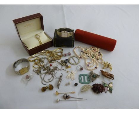 A quantity of costume jewellery to include necklaces, brooches, earrings and a Rotary ladies wristwatch