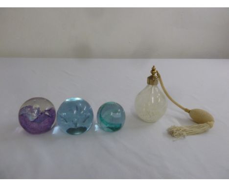 Three Caithness paperweights and a Caithness perfume atomiser