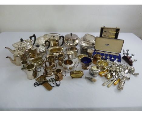 A quantity of silver plate to include teasets, dishes, entr‚e dish and cover and flatware
