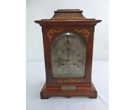 An Edwardian inlaid striking and chiming bracket clock, the silvered dial with Roman numerals, the mahogany case with satinwo