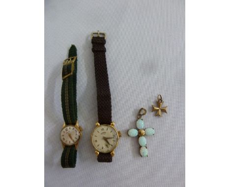 Two ladies gold wristwatches, a pendant and a 9ct opal cross