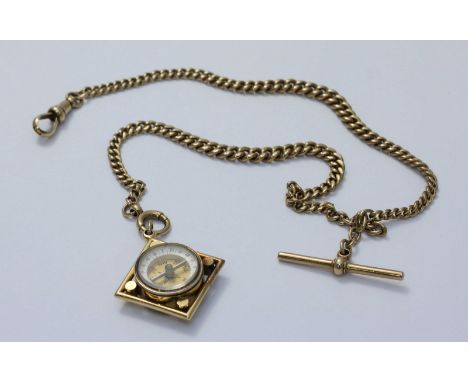 A 9ct gold double Albert chain with T-bar and bulldog clip and a yellow metal (tests as 9ct gold) compass fob. Gross weight a