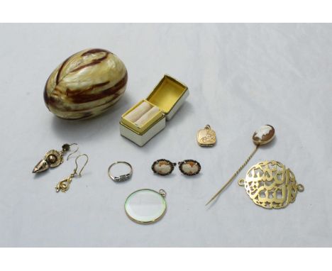 A small quantity of assorted yellow metal jewellery items, some testing as 9ct gold including a cameo stick pin, a ring and a