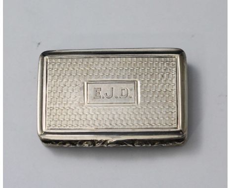 A George IV silver and silver-gilt vinaigrette, of rectangular form with 'EJD' engraved cartouche to the engine-turned top an