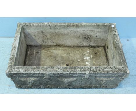 A reconstituted stone planting trough of rectangular form, moulded with bands of Greek key. 89 x 51cm.