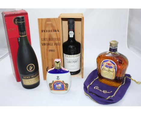 A bottle of Remy Martin Fine Champagne Cognac VSOP, together with bottle of Ferreira late bottled Vintage Port 1980, a 75cl b