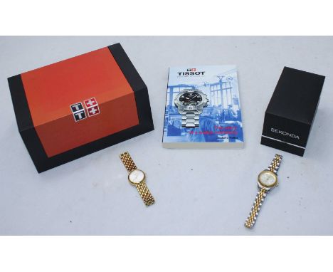 A ladies gold plated and stainless steel Tissot wristwatch, in original branded box, together with a boxed ladies two-tone Se