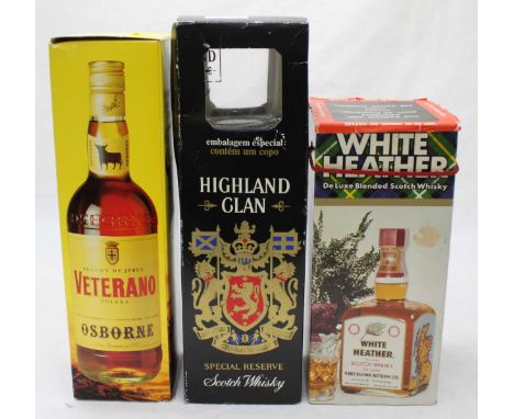 A boxed bottle of White Heather Scotch Whisky Deluxe, together with a boxed Highland Clan Scotch Whisky and a bottle of Veter