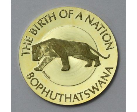 An 18ct gold 'Bophuthatswana Independence Medallion.' Issue number 1145. Gross weight approximately 36g.