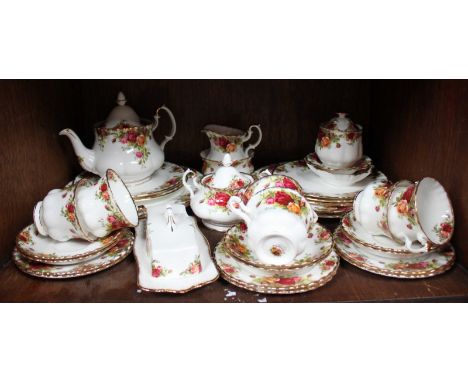 SECTION 33. A part Royal Albert 'Old Country Roses' tea and dinner service comprising teapot, dinner plates, side plates, sug