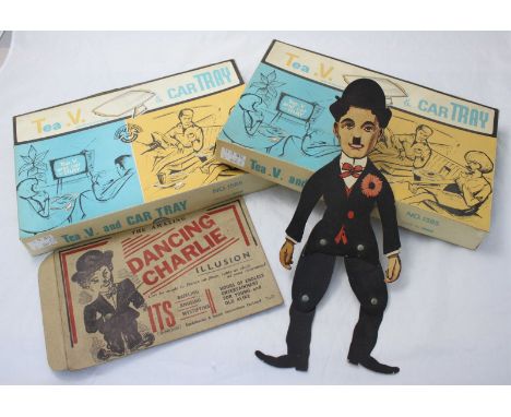 An amazing dancing Charlie cardboard articulated novelty toy of Charlie Chaplin with original packaging, and two boxed vintag