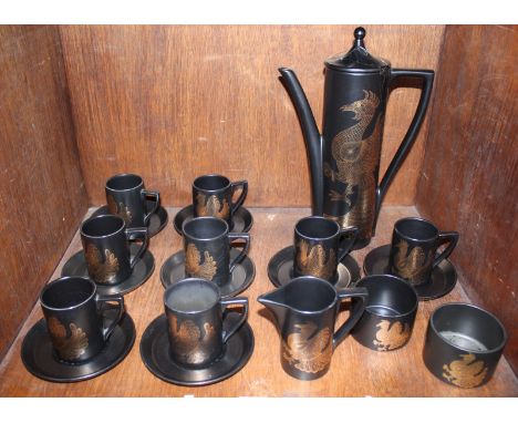 SECTION 34.  A Portmeirion 'Phoenix' coffee set comprising coffee pot, eight cups and saucers, milk jug and two sugar bowls