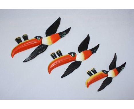 Set of three graduated Carltonware Guinness Toucan wall plaques, the largest measuring approximately 10"