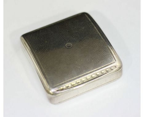 A George III silver and silver-gilt snuff box of square form and curved profile, gilt interior and engine-turned exterior dec