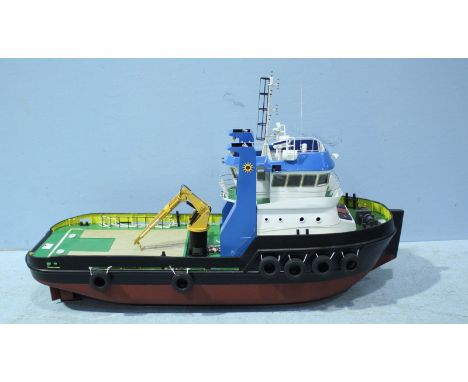 A Radio-controlled 1:32 scale model of the Multi-Purpose Tug 'Dutch Courage,' 87cm x 28cm, with radio remote control etc