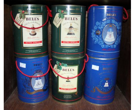 Six bottles of Bell's Extra Special Old Scotch Whisky, Christmas editions and Royal Commemorative's, in 75cl Wade pottery dec