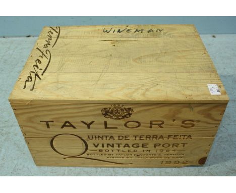 A twelve-bottle wooden case of Taylor's Quinta De Terra Feita 1982 Vintage Port (unopened owc)