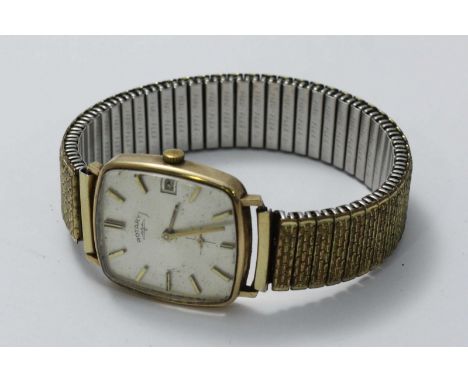 A gents 9ct gold cased Rotary wristwatch, the rectangular silvered dial with applied batons denoting hours, subsidiary second