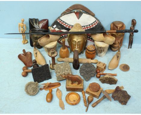 A quantity of carved wooden ethnic items, hand-carved wooden textile printing blocks, articulated artists wooden model, shoe 