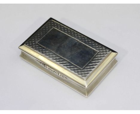 A Victorian silver and silver-gilt snuff box of rectangular form, with engine-turned hinged cover and base, reeded sides and 