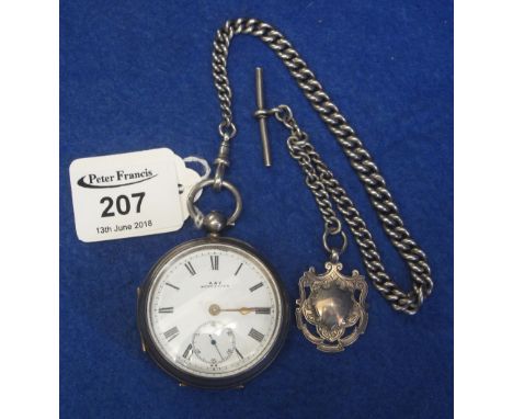 Kay of Worcester silver engine turned open face, key wind pocket watch with Roman enamel face, having seconds dial, on a silv