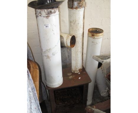 Cast iron wood burning stove with enamel flue.(B.P. 24% incl. VAT)