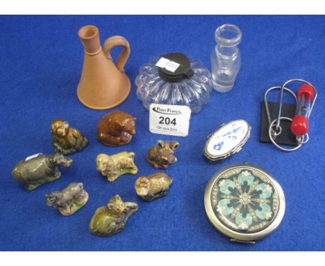 Group of oddments to include eight Wade Whimsies, a Victorian fluted glass inkwell, compact, oval patch type box, magnet test
