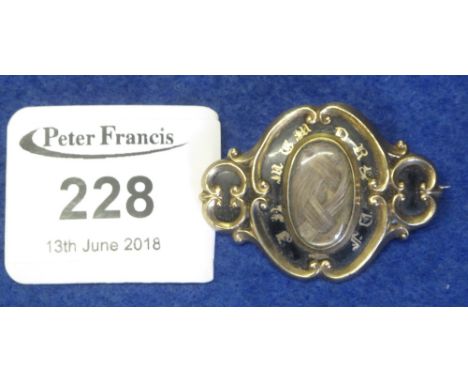Victorian yellow metal and black enamel mourning brooch.(B.P. 24% incl. VAT)