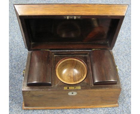 Early 19th Century rosewood sarcophagus shaped tea caddy with two compartments and associated wooden mixing bowl to the inter