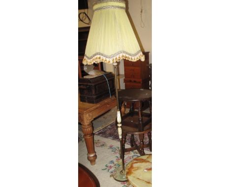 Gilt onyx standard lamp with shade, together with a matching oval coffee table.  (2)(B.P. 24% incl. VAT)