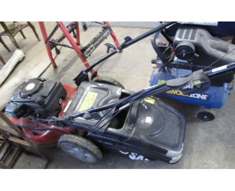 A Sanli four stroke rotary lawn mower with grass collector.(B.P. 24% incl. VAT)