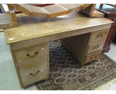 Large solid oak knee hole desk with three drawers to one pedestal, and two to the other.(B.P. 24% incl. VAT)