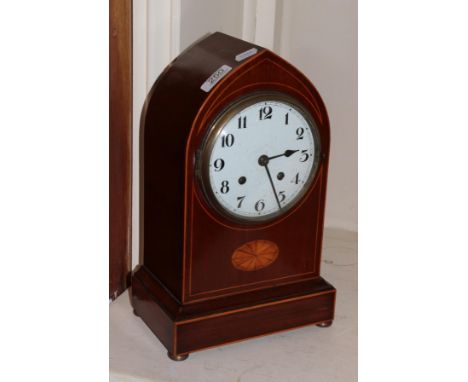 An Edwardian inlaid mahogany striking mantel clock  