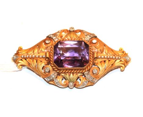 An amethyst, seed pearl and diamond brooch in a matte finish frame, unmarked, length 7.2cm .  Gross weight 23.9 grams. 