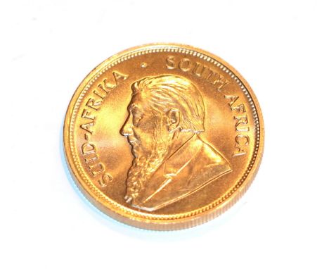 South Africa, 1974 Krugerrand. 1 oz. fine gold (.999). Obv: Bust of Paul Kruger left. Rev: Springbok, 19 - 74 either side. KM