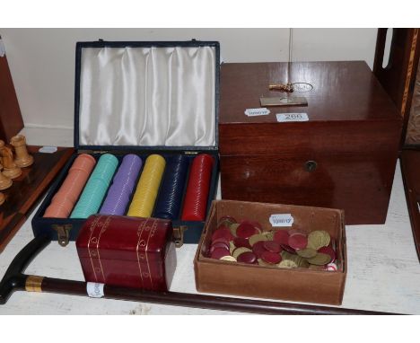 A cigar humidor with silver cigar cutter, two boxes of games counters, a walking stick and a leather card box&nbsp;