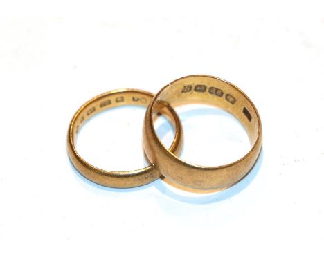 Two 22 carat gold band rings, finger sizes I and K.  Gross weight 9.02 grams. 