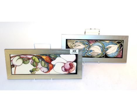 Two limited edition Moorcroft plaques (2). Plaque size - 31cm by 10.5cm (excluding frame). Other - 30.5cm by 10.5cm Both firs