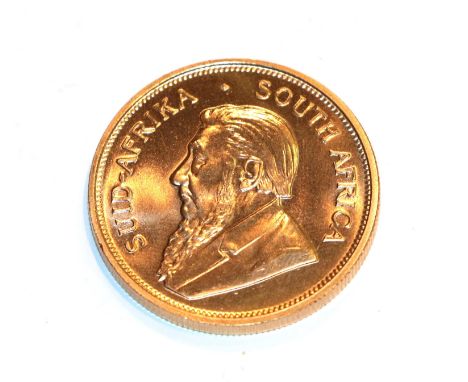 South Africa, 1974 Krugerrand. 1 oz. fine gold (.999). Obv: Bust of Paul Kruger left. Rev: Springbok, 19 - 74 either side. KM