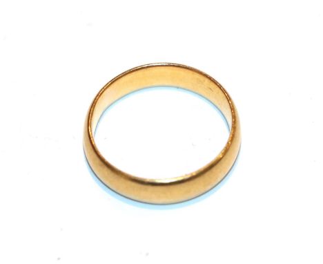 A 22 carat gold band ring, finger size K.  Gross weight 4.28 grams